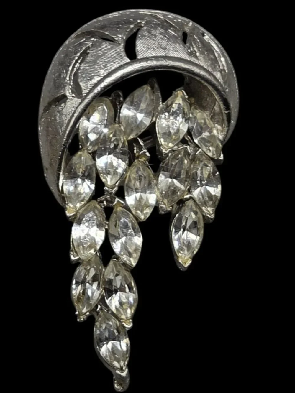 None this brooch